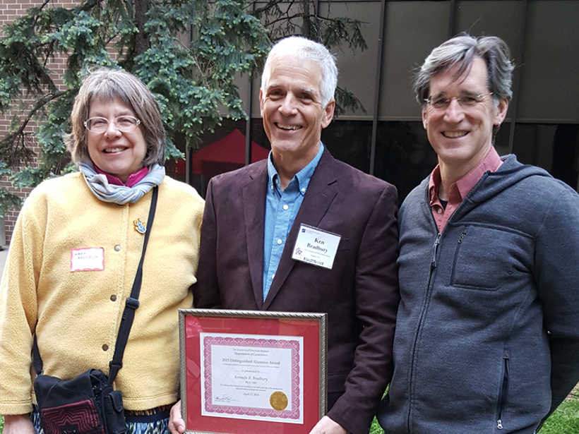 Geologists Mary Anderson, Ken Bradbury, and Harold Tobin smile for the cameras