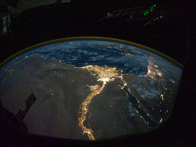 Electric lights illuminate the Nile and its delta in this satellite image captured at night.