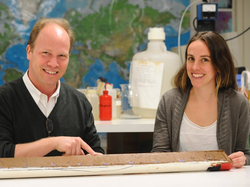 Scientists point out red Saharan dust in a sediment core drilled from the Atlantic Ocean floor off West Africa.