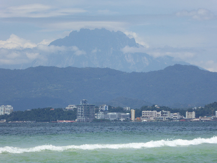 Mount Kinabalu towers over Kota Kinabalu, the capital of the Malaysian state of Sabah in northern Borneo.