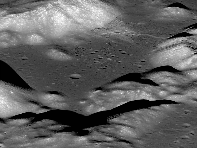 Close-up, black-and-white satellite image of the lunar landscape