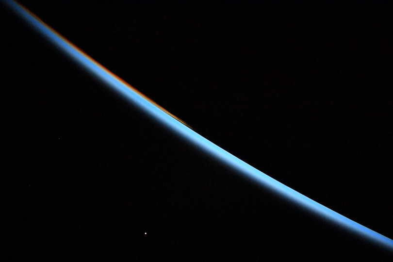 International Space Station photo of Earth’s horizon and Venus