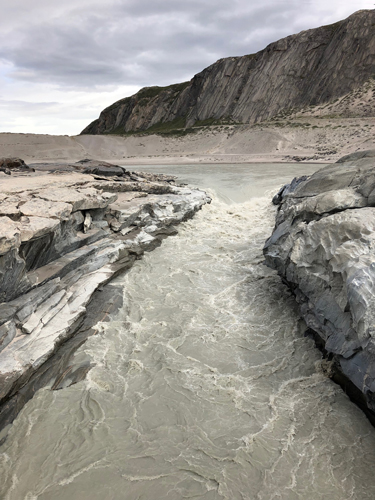 Meltwater stream running off the Greenland Ice Sheet near Kangerlussuaq. Meltwater stream running off the Greenland Ice Sheet near Kangerlussuaq.