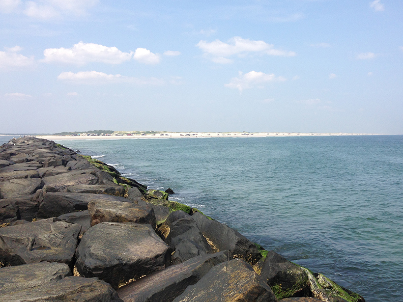 Photo of a jetty and ocean beach