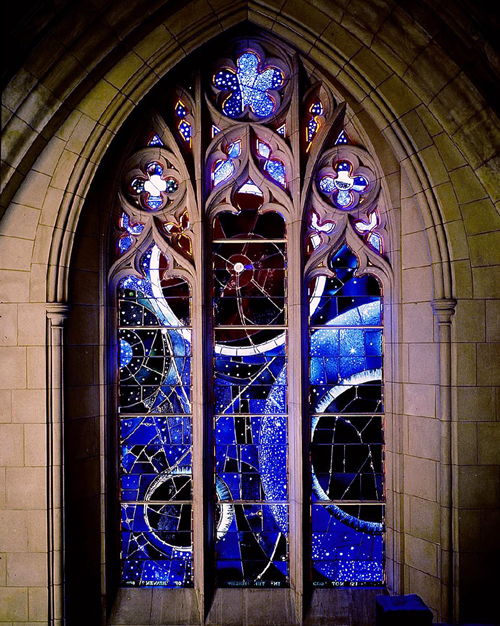 Space-themed stained glass window