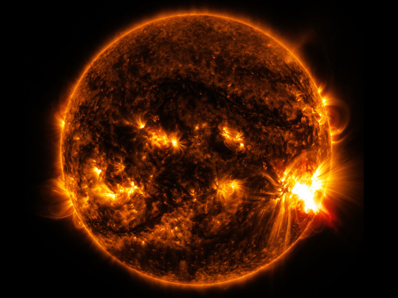 Image of the Sun with bright solar flares