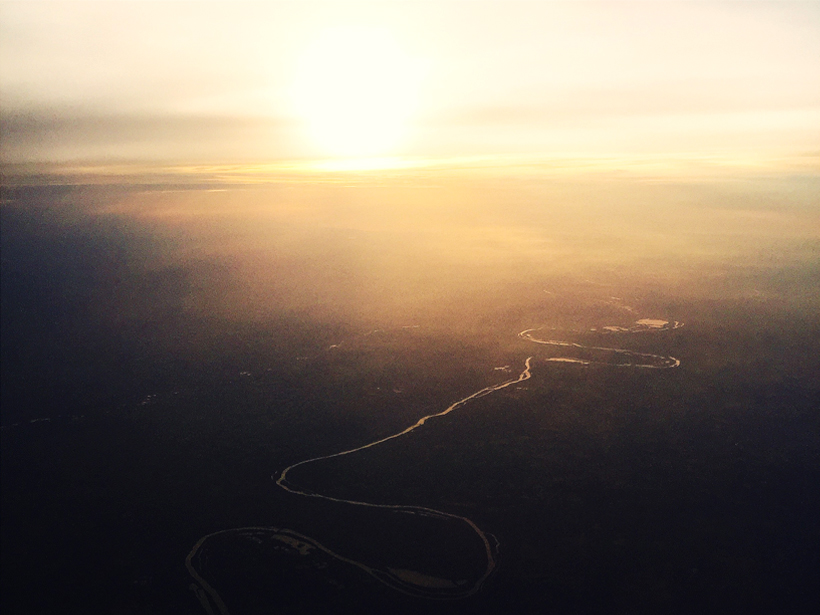 Aerial view of the Ebro River snaking into the sunset