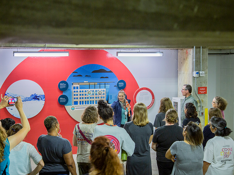 Christine Gibney takes teachers on a tour of AGU Headquarters