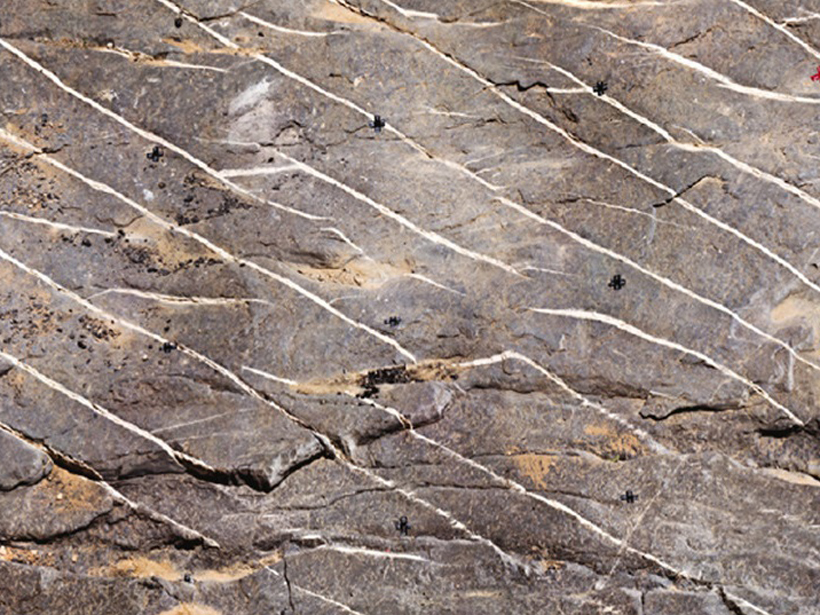 Photograph showing calcite-filled fractures in limestone in the Oman Mountains