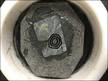 A wafer-thin garnet crystal A wafer-thin garnet crystal