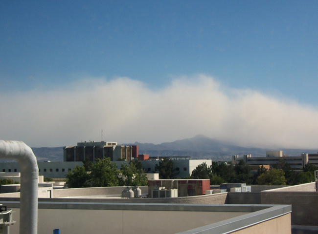 Dust storm approaches a desert city