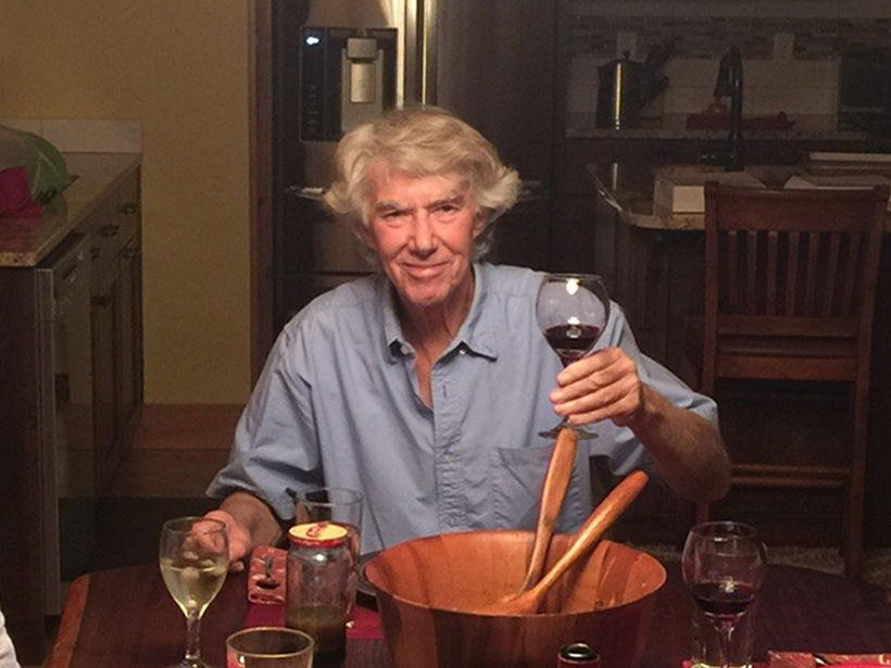 Photo of Richard M. Thorne seated at a table