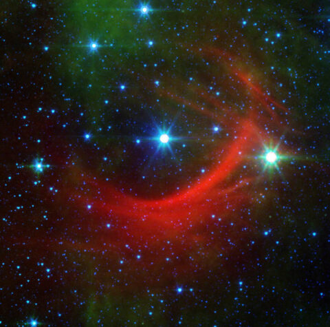Green, blue, and red light emitted by gas clouds with blue stars