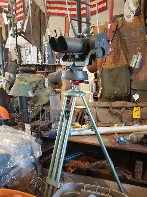 tripod-mounted military surplus binoculars