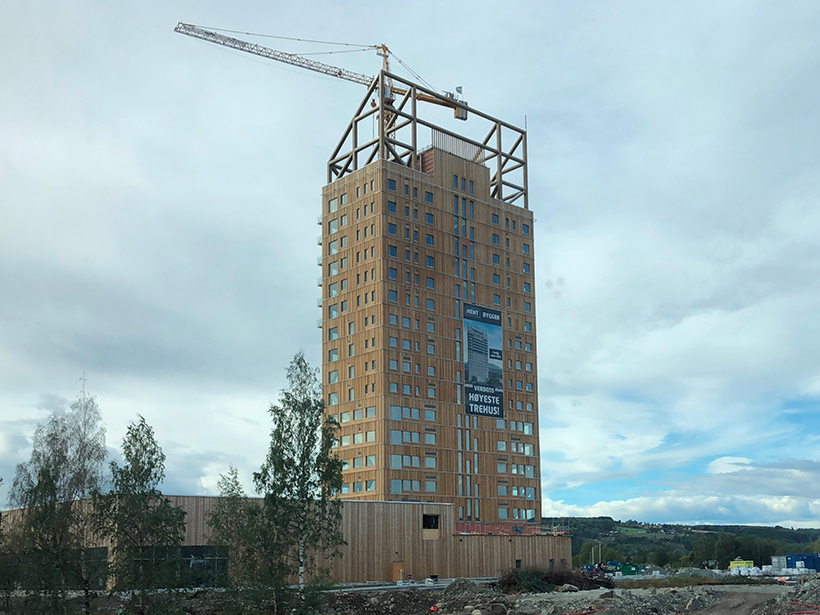 An image of an 18-story wooden high-rise under construction in Brumunddal, Norway