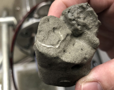 Photograph of a methane hydrate vein in a rapidly depressurized, coarse-grained sediment pressure core Photograph of a methane hydrate vein in a rapidly depressurized, coarse-grained sediment pressure core