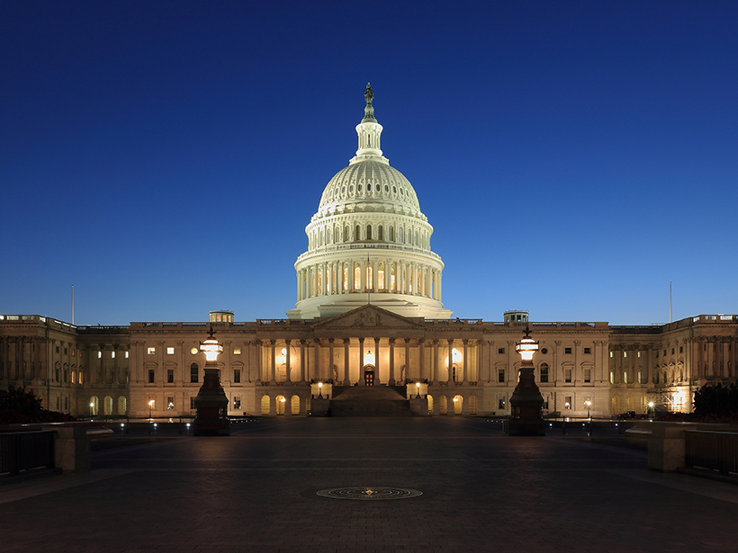 Lit U.S. Capitol Building at dusk