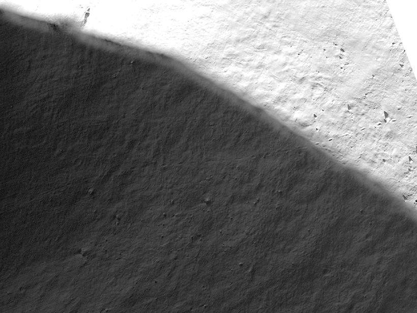 The track of a boulder that tumbled into one of the Moon’s permanently shadowed regions