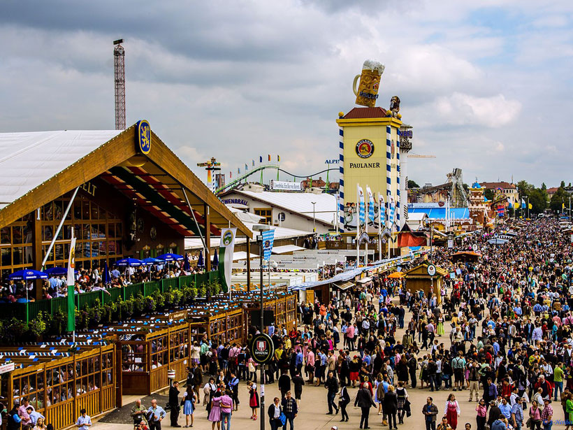 Crowd in front of a yellow tower