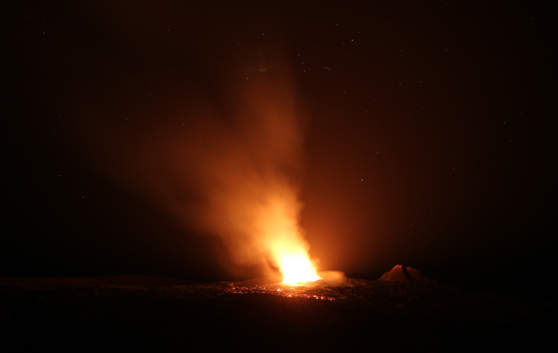 Lava lake at Erta Ale spits fire at night