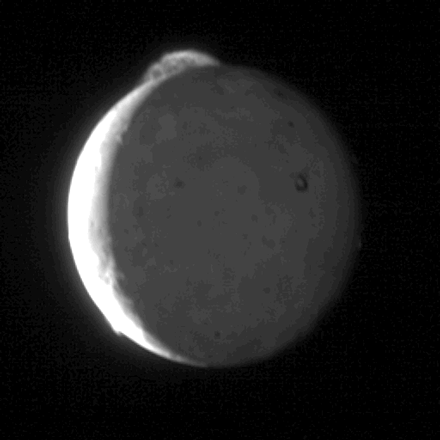 A black-and-white gif of a volcanic eruption on Jupiter’s moon Io