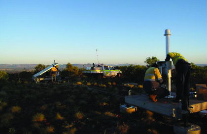 Engineers install a lightning sensor in rural Australia Engineers install a lightning sensor in rural Australia