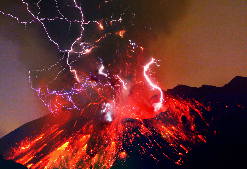 Lava, ash, and lightning erupting out of a volcano