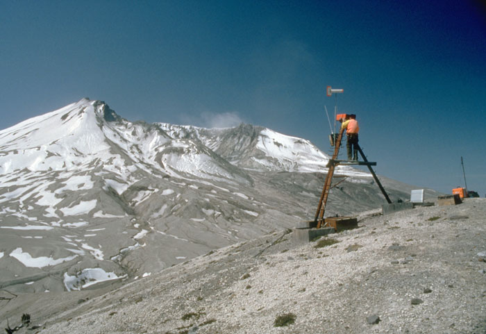 A scientist surveys the bulging flank on Mount St. Helens after the 1980 eruption. A scientist surveys the bulging flank on Mount St. Helens after the 1980 eruption.