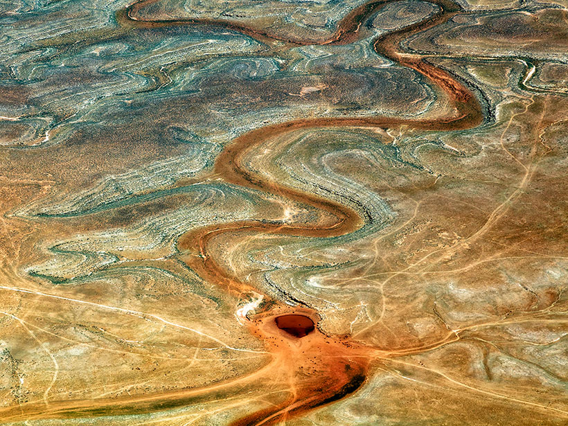 Aerial view of a meandering dry riverbed