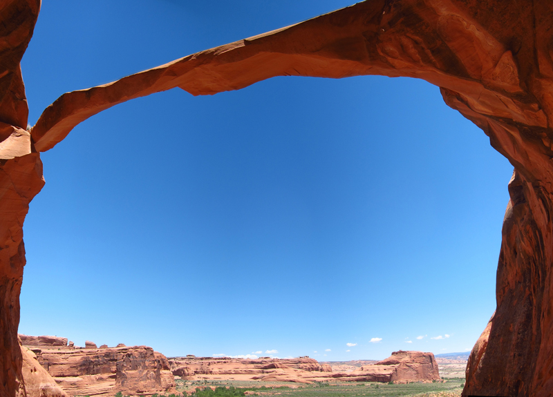 A thin band of rock stands against a bright blue sky at Ring Arch.