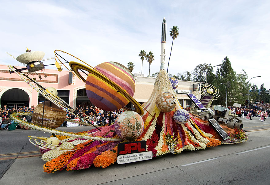 Rose Parade float with a rocket, planets, and satellites Rose Parade float with a rocket, planets, and satellites