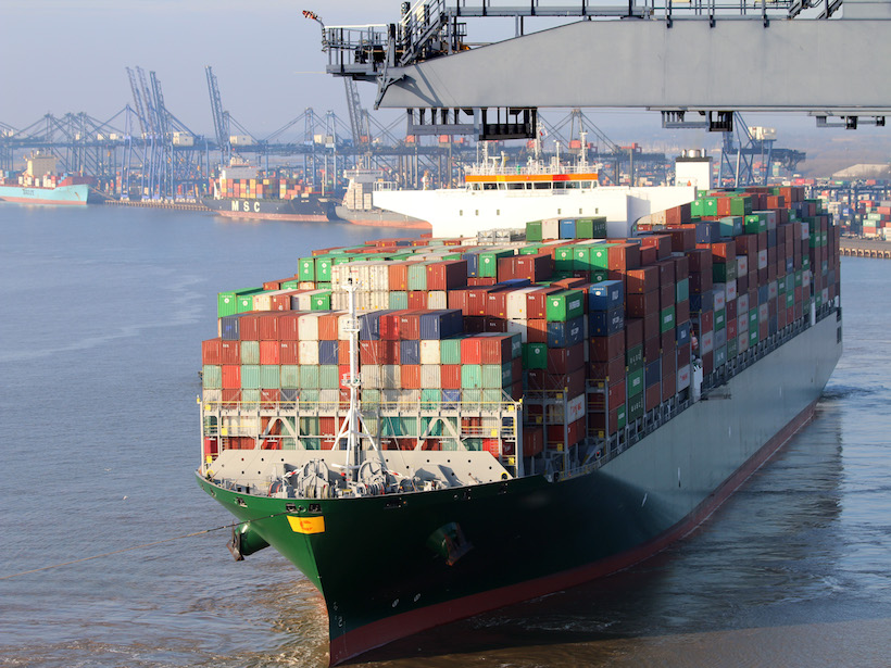 Container ships load and offload at the Port of Felixstowe, U.K.