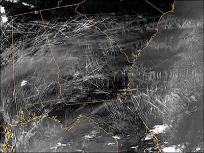 Contrails crisscross the southeastern United States in this NASA satellite image