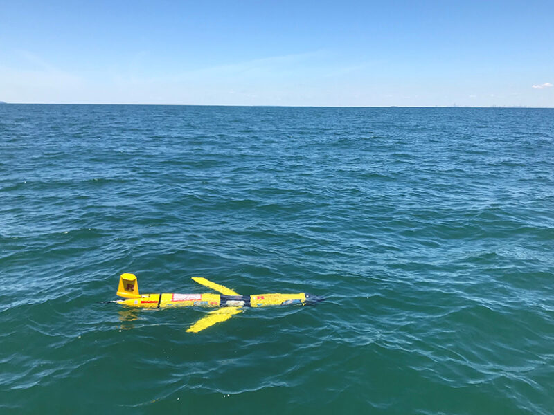 A yellow submarine glider floats on the ocean surface. A yellow submarine glider floats on the ocean surface.