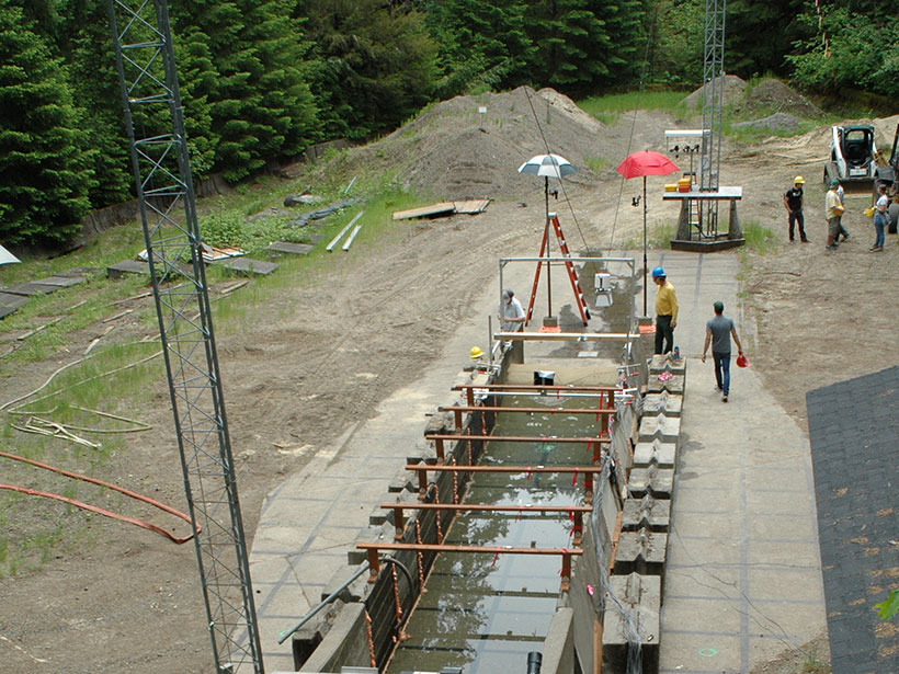 View looking down at the base of the USGS debris flow flume facility showing a makeshift pond and dam View looking down at the base of the USGS debris flow flume facility showing a makeshift pond and dam