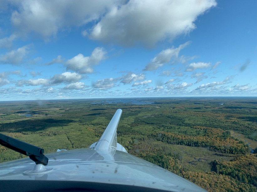 The University of Wyoming King Air samples water and carbon fluxes over an autumn-forested landscape in northern Wisconsin, USA, as part of the CHEESEHEAD19 study.
