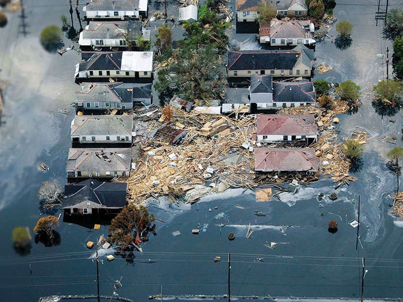 New Orleans, La., houses surrounded by debris and floodwater from Hurricane Katrina in 2005.