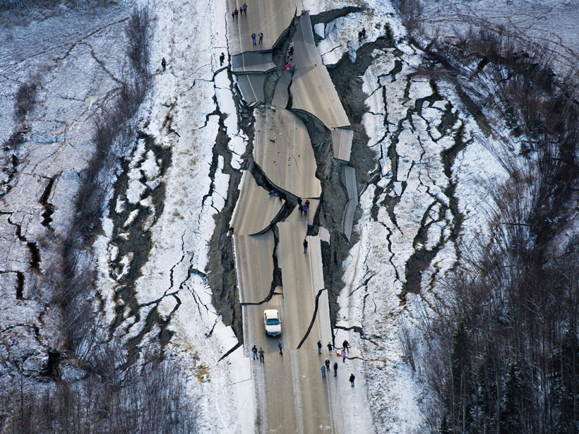 A road south of Wasilla, Alaska, and the ground around that was shattered by back-to-back magnitude 7 and 5.7 earthquakes.