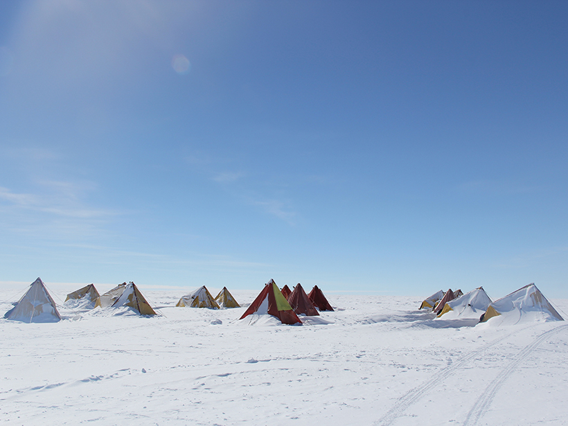 Tents set up on a snow and ice field in Aurora Basin North, East Antarctica