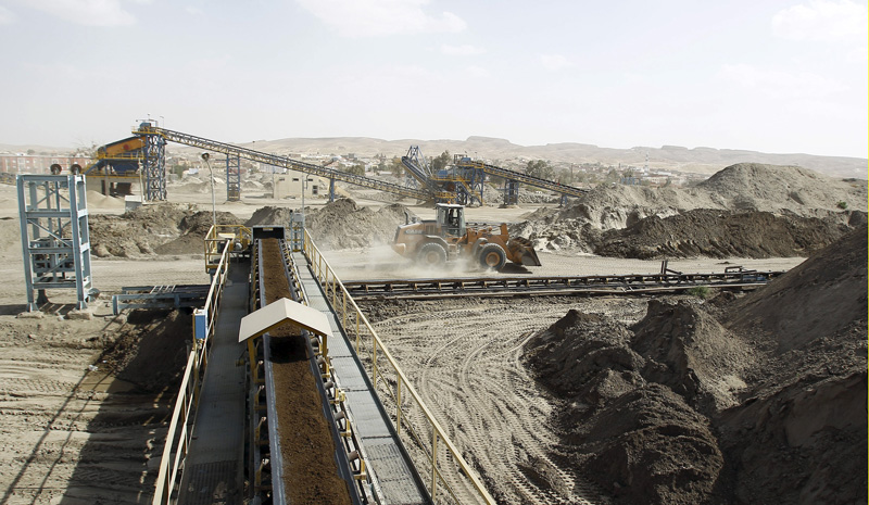 A bulldozer operating at a phosphate mine in Métlaoui, Tunisia, in 2012