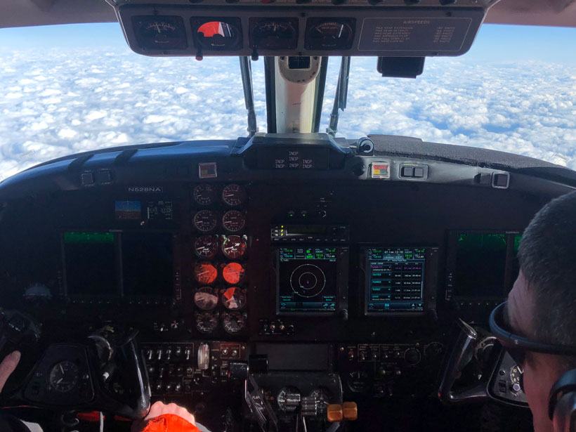 View of shallow cumulus clouds from the cockpit of the King Air