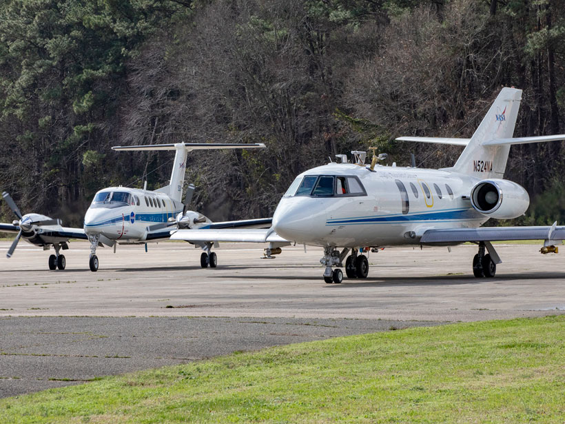 NASA’s King Air and Falcon sit on the tarmac at NASA Langley Research Center