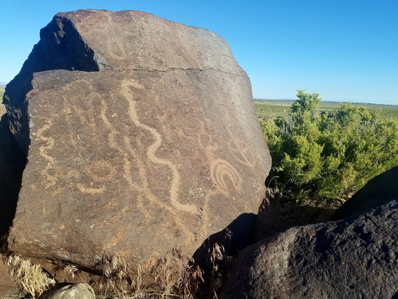 Abstract etchings adorn a rock in the Nevada desert. Abstract etchings adorn a rock in the Nevada desert.