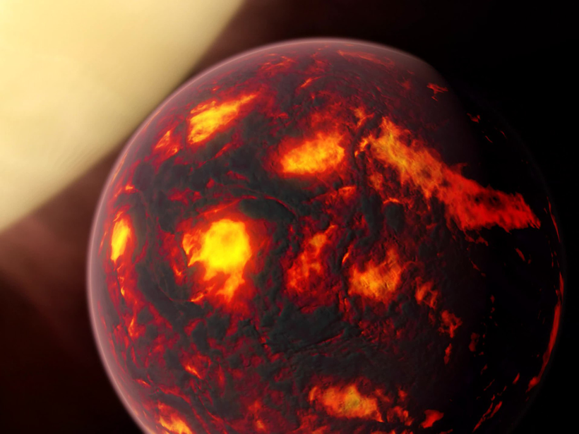 An artist’s illustration of a dark planet with bright red spots that represent molten lava on the planet’s surface. The planet hovers in front of a yellow star