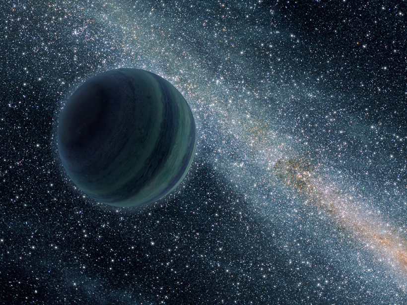 A rogue planet glides through the galaxy alone in this artist’s impression.