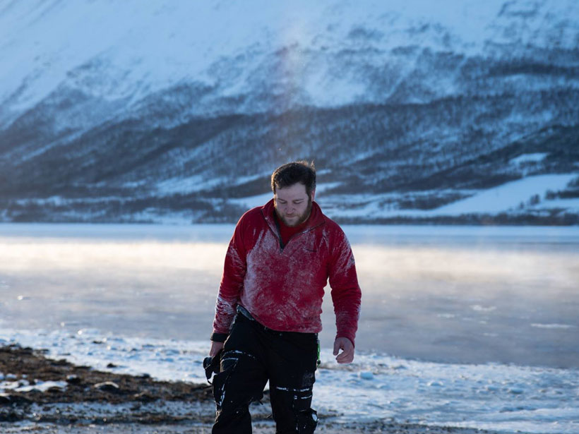 Andrews in the Arctic climbing on snow.