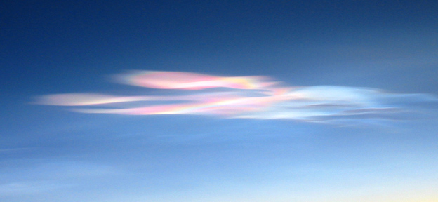 Photograph of mother-of-pearl clouds over Iceland in January 2003.