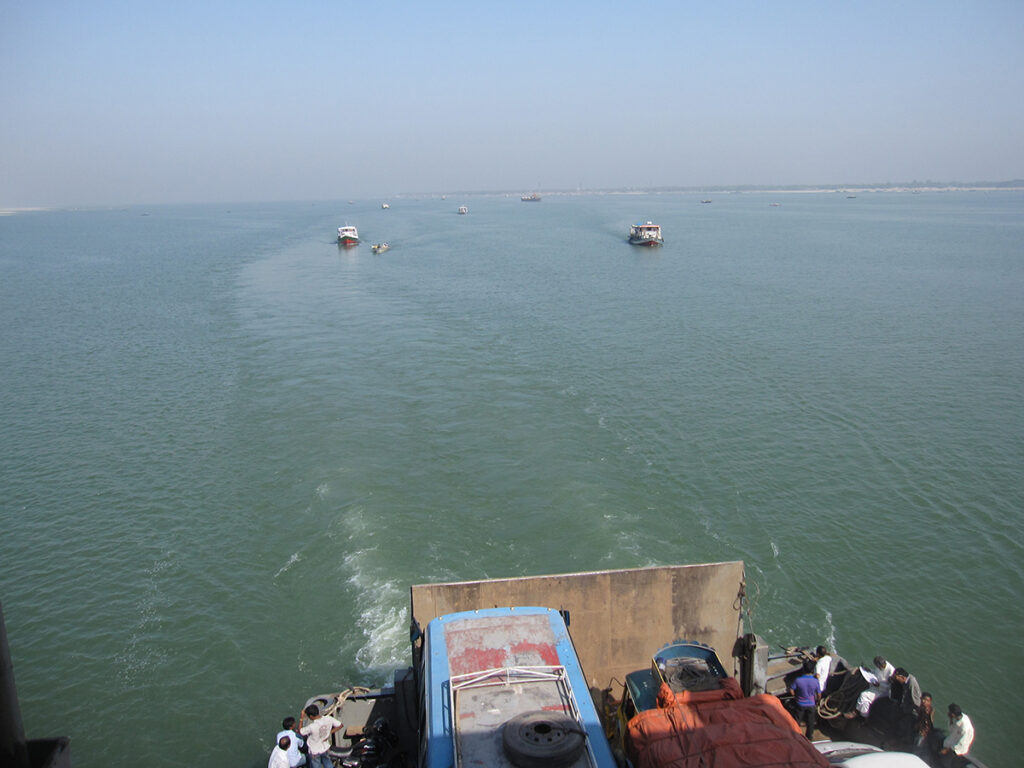 Daytime view of the Brahmaputra River from a boat