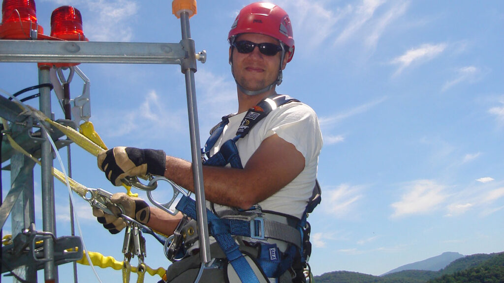 Ryan Emanuel works on an atmospheric monitoring station on the campus of Appalachian State University, N.C.