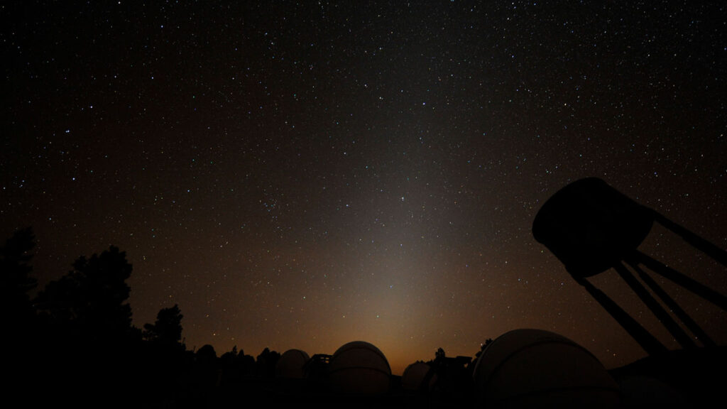 Sunlight reflecting off tiny, interplanetary “cosmic dust” particles